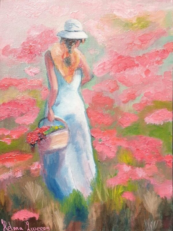 5) Vrouw in veld met roze bloemen
